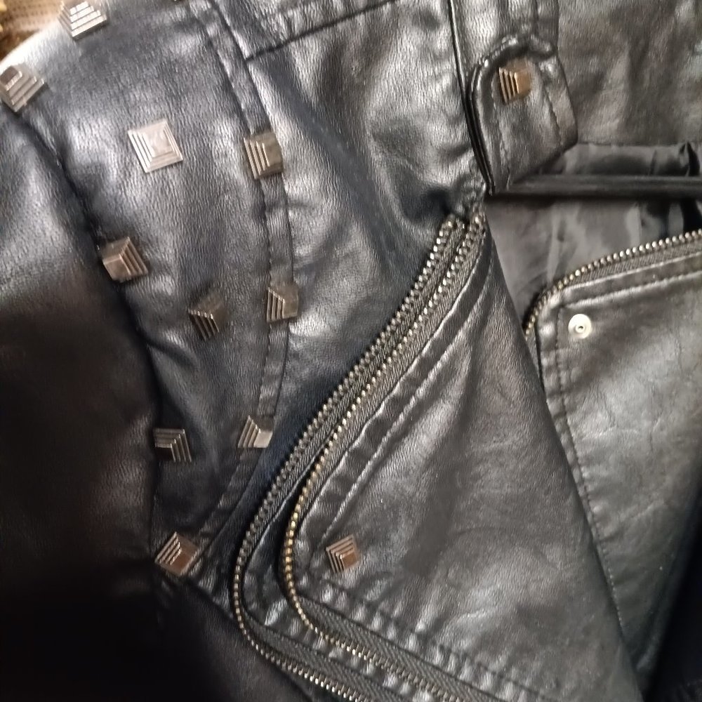 Black faux leather studded jacket